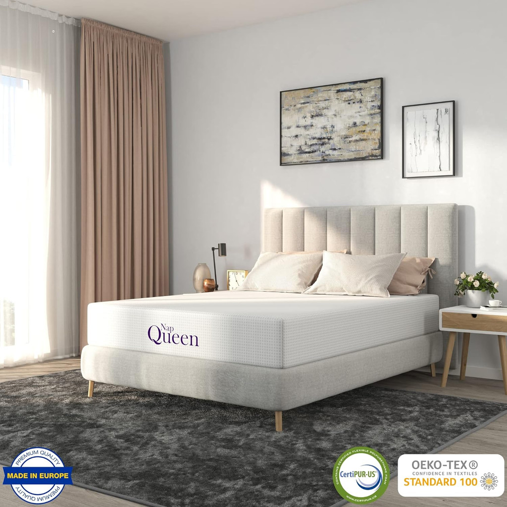 Queen size mattress in a bedroom with branding Nap Queen